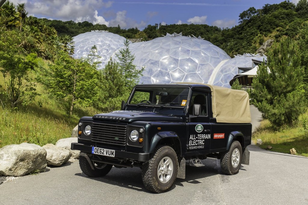 An Electric Land Rover Defender poses for a picture at the Eden Project
